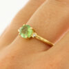 Fairtradegold Ring mit Brillanten und grünem Turmalin